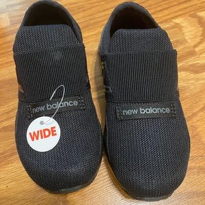 Black New Balance toddler sneakers. Wide width.